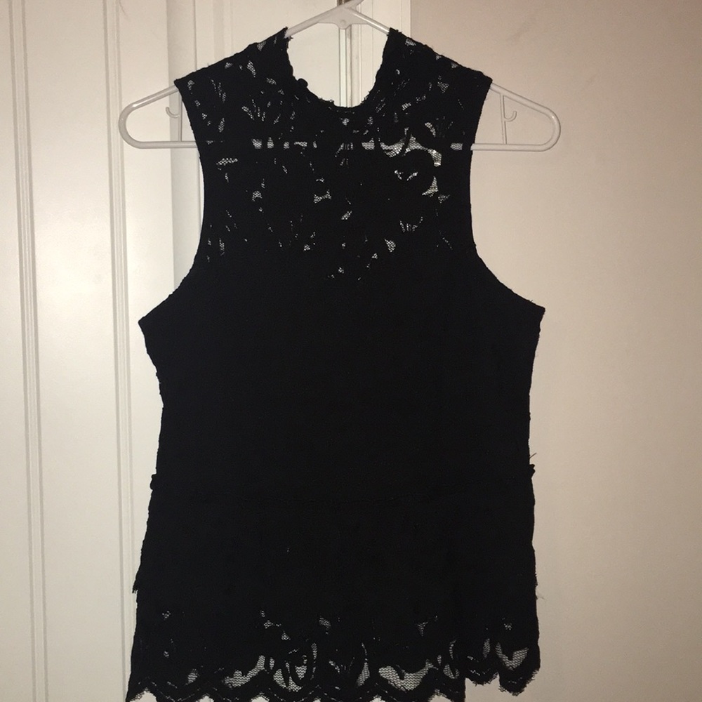 NWT Black Express Peplum top with lace overlay.